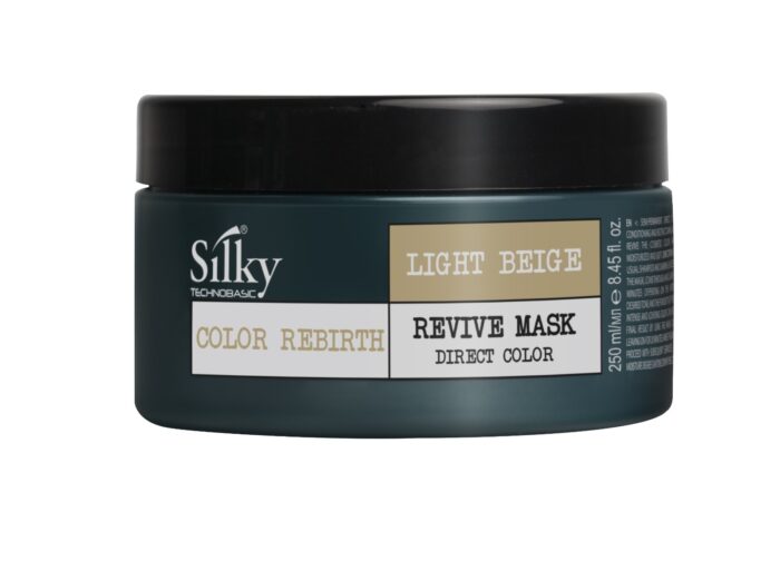 En rund burk med SILKY REVIVE MASK DIRECT COLOR i ljusbeige, 250 ml, perfekt för alla kön. Den har ett elegant svart lock ovanpå sin mörka burkdesign.